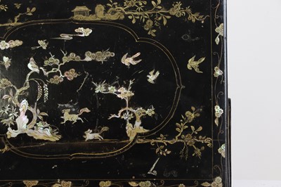 Lot 318 - A black-lacquered and mother-of-pearl inlaid collector's box