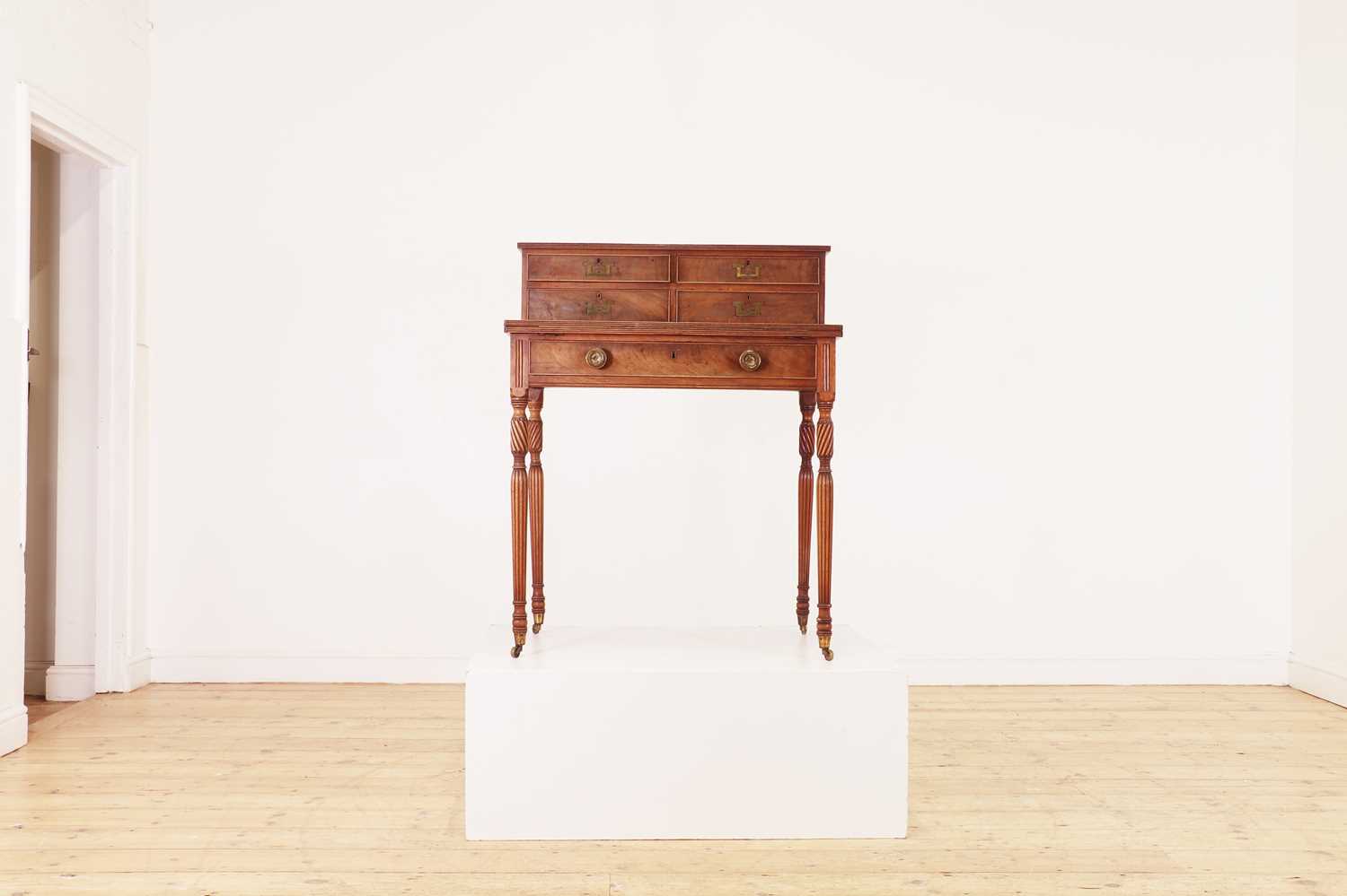 Lot 150 - A George III mahogany writing desk