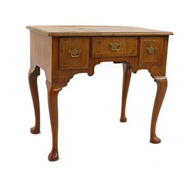 Lot 296 - A walnut lowboy