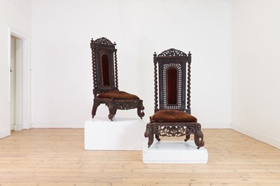 Lot 147 - A near pair of carved rosewood occasional chairs