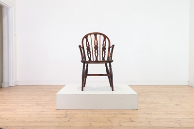 Lot 360 - A yew and elm Windsor chair