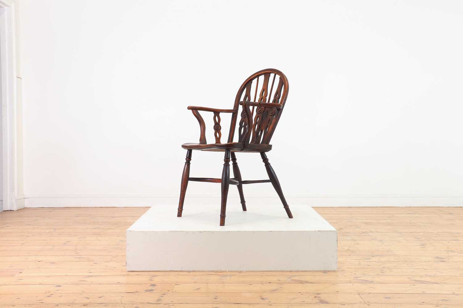 Lot 360 - A yew and elm Windsor chair