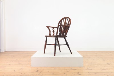 Lot 360 - A yew and elm Windsor chair
