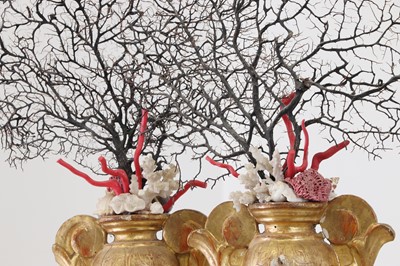 Lot 320 - A pair of giltwood, coral and shell altar urns