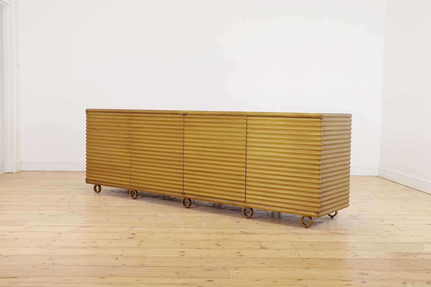 Lot 77 - A brass 'Portobello' cabinet by Julian Chichester