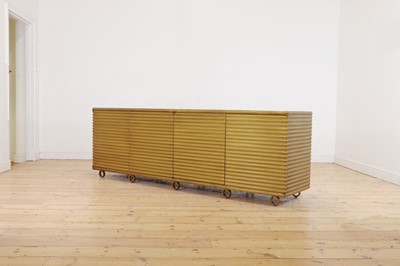Lot 77 - A brass 'Portobello' cabinet by Julian Chichester