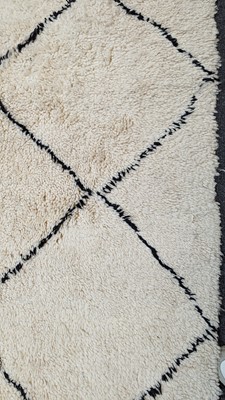 Lot 355 - A wool Berber or Beni Ourain rug