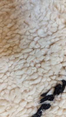 Lot 355 - A wool Berber or Beni Ourain rug