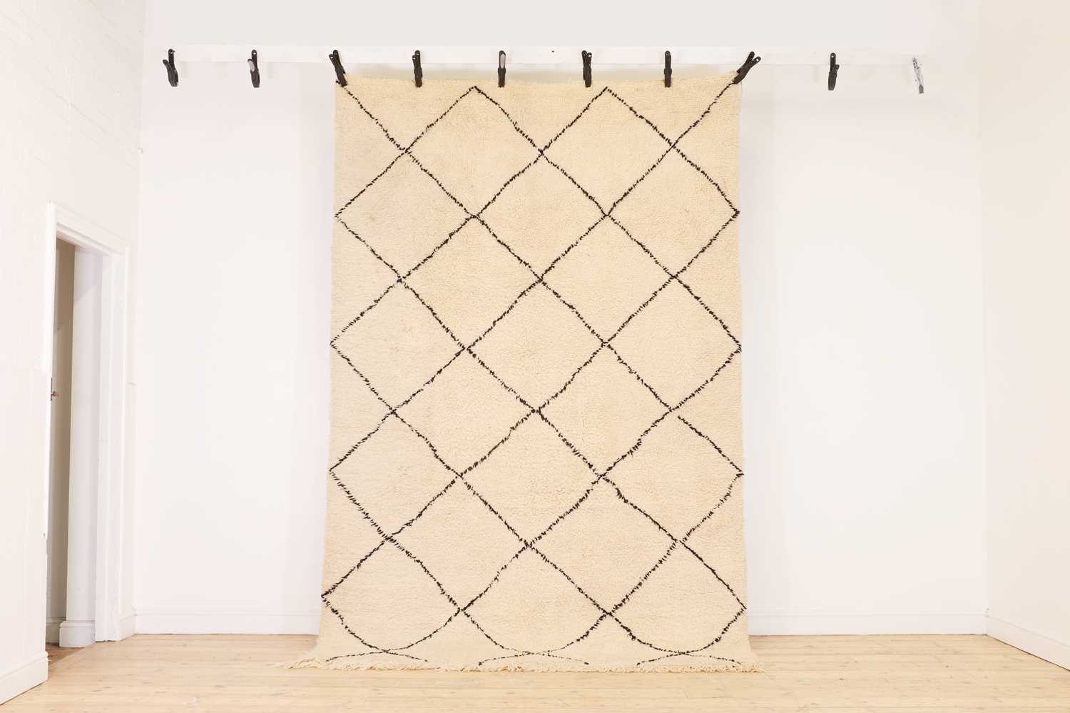 Lot 355 - A wool Berber or Beni Ourain rug