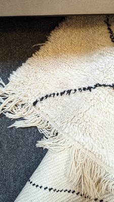 Lot 355 - A wool Berber or Beni Ourain rug