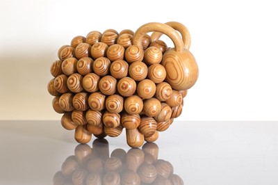 Lot 315 - A Finnish pine and beech 'Pohjanpässi' figurine