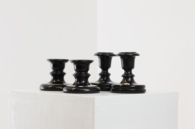 Lot 250 - A pair of Ashford black marble candlesticks
