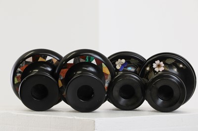 Lot 250 - A pair of Ashford black marble candlesticks