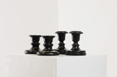Lot 250 - A pair of Ashford black marble candlesticks