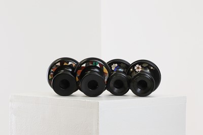Lot 250 - A pair of Ashford black marble candlesticks