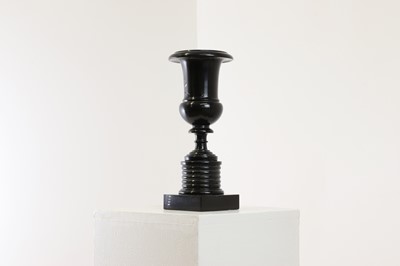 Lot 259 - An Ashford black marble pedestal vase