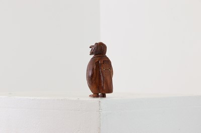 Lot 162 - A coquilla nut figural snuffbox