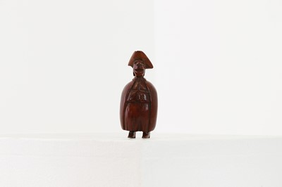 Lot 163 - A coquilla nut figural snuff box