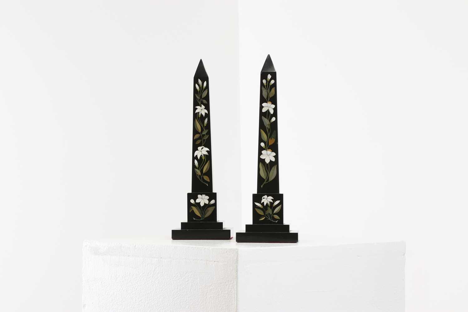 Lot 242 - A pair of Ashford black marble obelisks