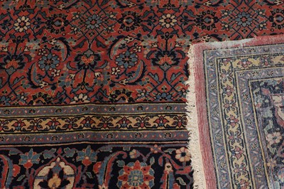 Lot 342 - A large wool Persian carpet