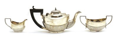 Lot 61 - A three piece silver tea service