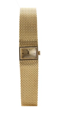 Lot 552 - A ladies' 18ct gold Omega mechanical bracelet watch