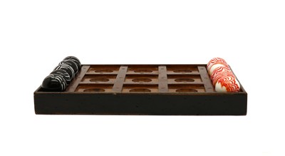Lot 185 - A tic tac toe board