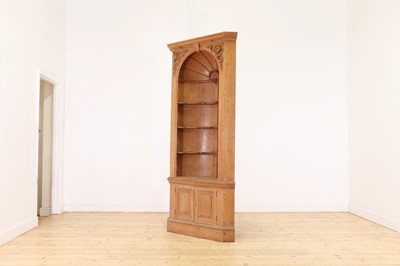 Lot 161 - A George II-style pine standing corner cupboard
