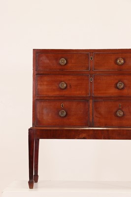 Lot 302 - A small George III mahogany chest on stand