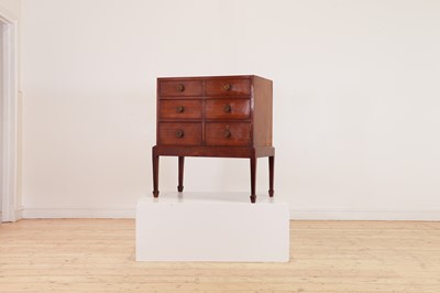 Lot 302 - A small George III mahogany chest on stand