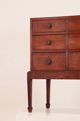 Lot 302 - A small George III mahogany chest on stand