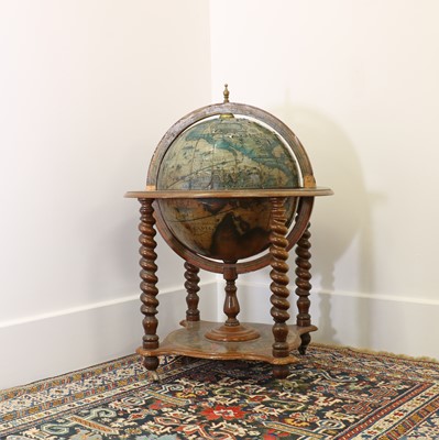 Lot 35 - A terrestrial globe drinks cabinet