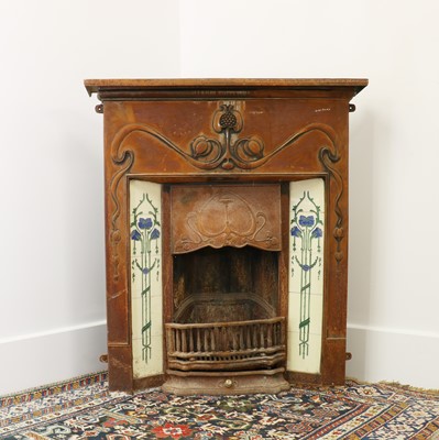 Lot 5 - An Art Nouveau cast iron fire surround