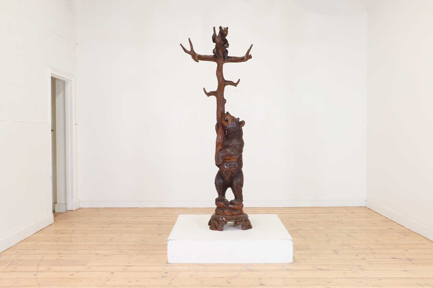 Lot 632 - A Black Forest carved wood hallstand