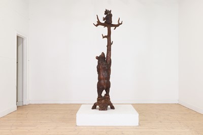 Lot 632 - A Black Forest carved wood hallstand