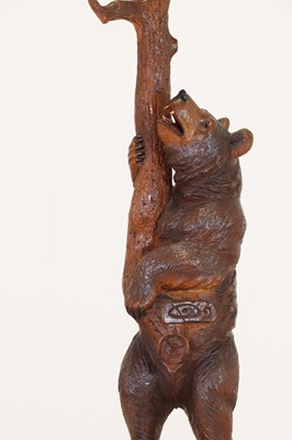Lot 632 - A Black Forest carved wood hallstand