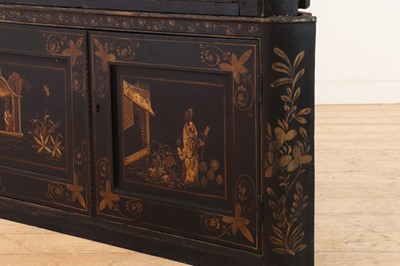 Lot 359 - A black and gilt japanned corner cabinet