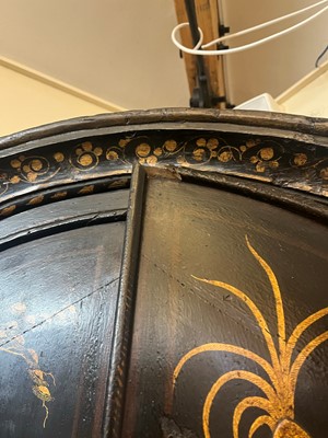 Lot 359 - A black and gilt japanned corner cabinet
