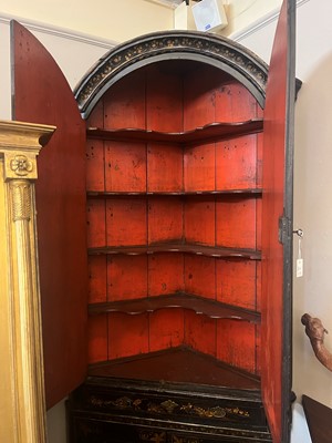 Lot 359 - A black and gilt japanned corner cabinet