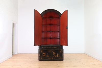 Lot 359 - A black and gilt japanned corner cabinet