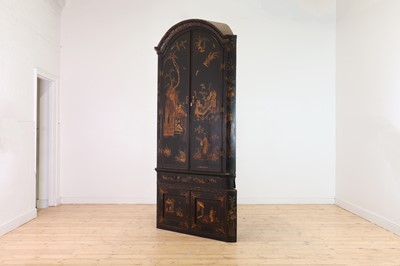 Lot 359 - A black and gilt japanned corner cabinet