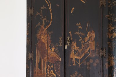 Lot 359 - A black and gilt japanned corner cabinet