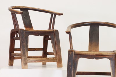 Lot 348 - A pair of elm horseshoe-back chairs