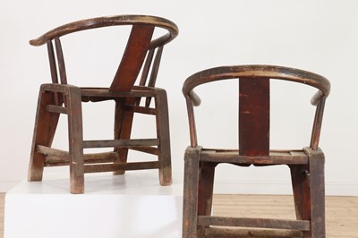 Lot 348 - A pair of elm horseshoe-back chairs
