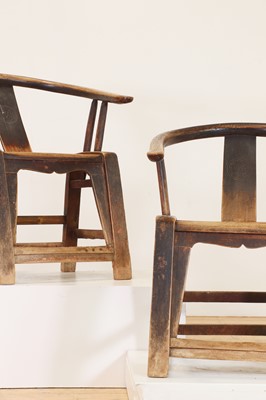 Lot 348 - A pair of elm horseshoe-back chairs