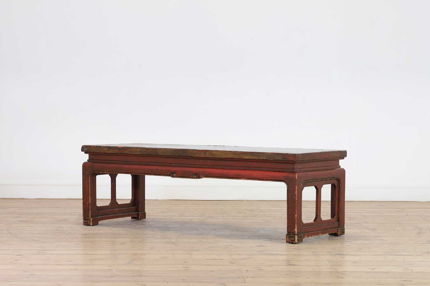 Lot 161 - A red-lacquered low table