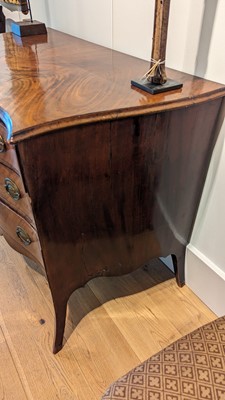 Lot 89 - A George III mahogany serpentine commode