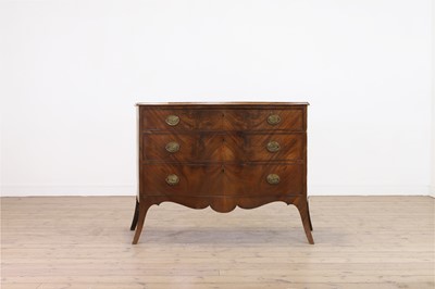 Lot 89 - A George III mahogany serpentine commode