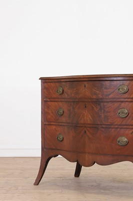 Lot 89 - A George III mahogany serpentine commode