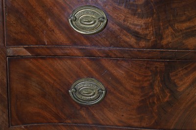 Lot 89 - A George III mahogany serpentine commode